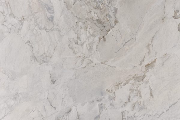 Sedimentary rocks, Dolomites are akin to limestone, albeit harder and denser. Dolomites often showcase unique pink or brown hues, as seen in KönigNaturals Calacatta Matarazzo. Their hardness falls between granite and marble, rendering them more susceptible to scratching. Due to their vulnerability to acid etching, polished finishes are not recommended.