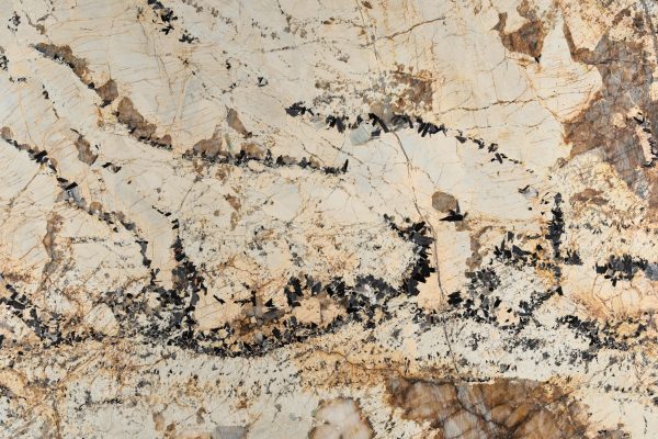 Quartzites are composed almost entirely of Quartz, which imparts a hard glassy appearance. Quartzites are generally harder than granite but the most exotic and sought after, such as KönigNaturals Patagonia, also feature ‘inclusions’ and ‘impurities’. These are formed when different minerals are introduced, resulting in potential weak points within the material.